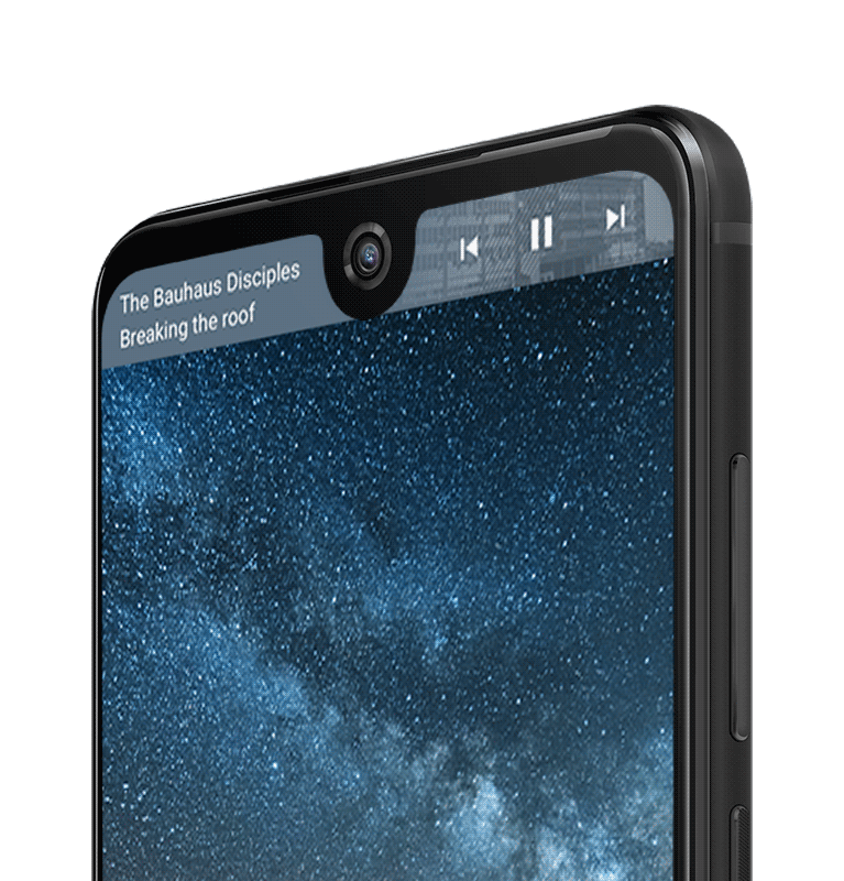 Hand manipulating a View 2 smartphone with mountains in background